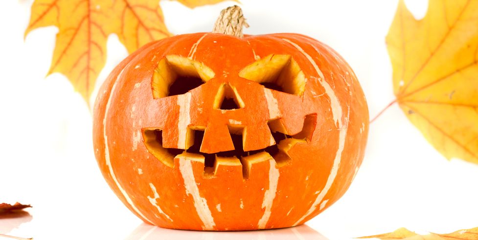 Halloween. Foto av gresskar med utskåret ansikt.