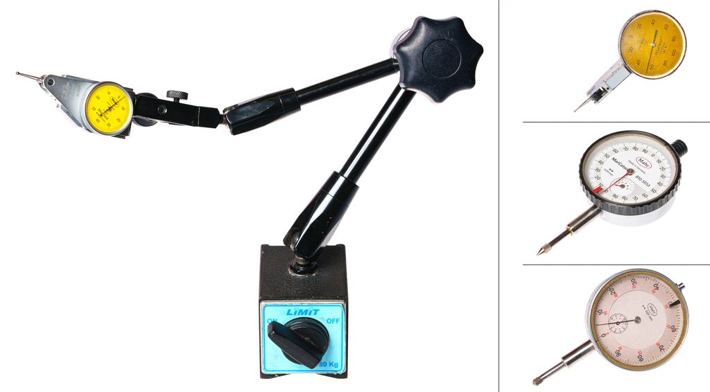 Rundt måleverktøy montert i et stativ med flere armer og ledd. Foto.