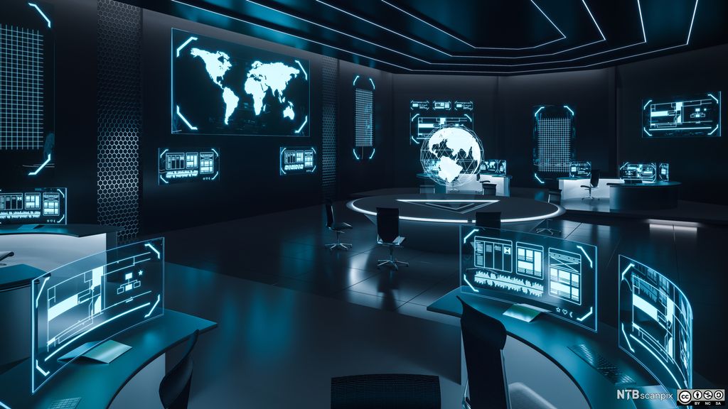Skjermer i et kontrollrom, som viser bilder fra hele verden. Foto.
