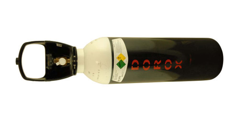 Svart gassbeholder med hvit topp. Foto.