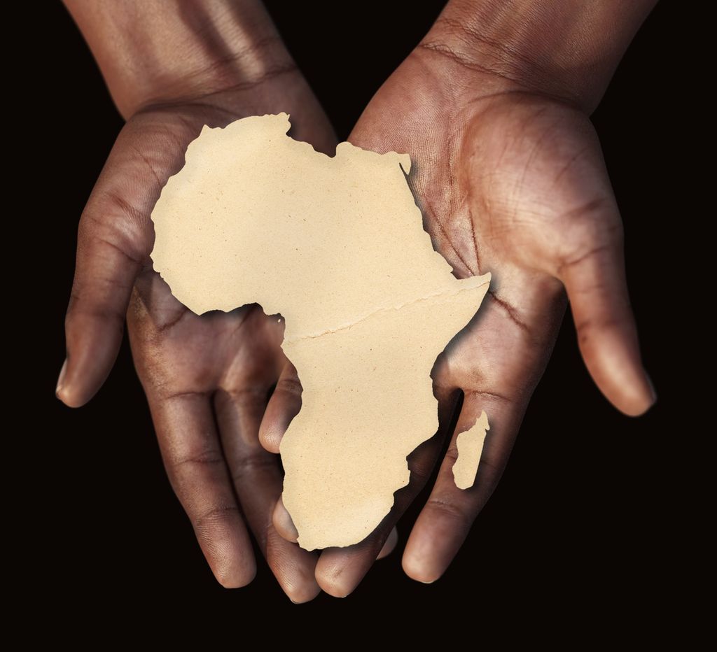 The black hands of an African man holding an African map in the palm of his hands. Illustration.
