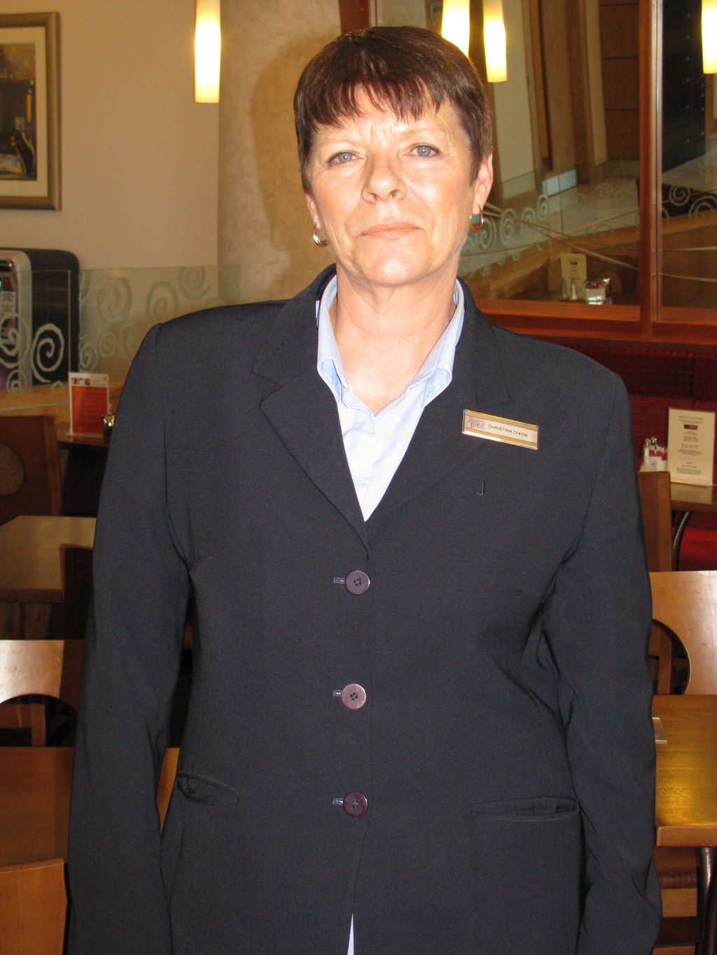 Female breakfast and lunch hostess at Jury's Inn. Photo.