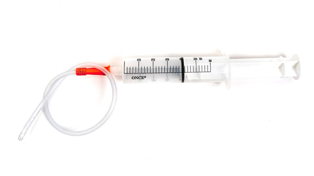 Plastsprøyte med en mjuk og tynn plastslange. Foto.