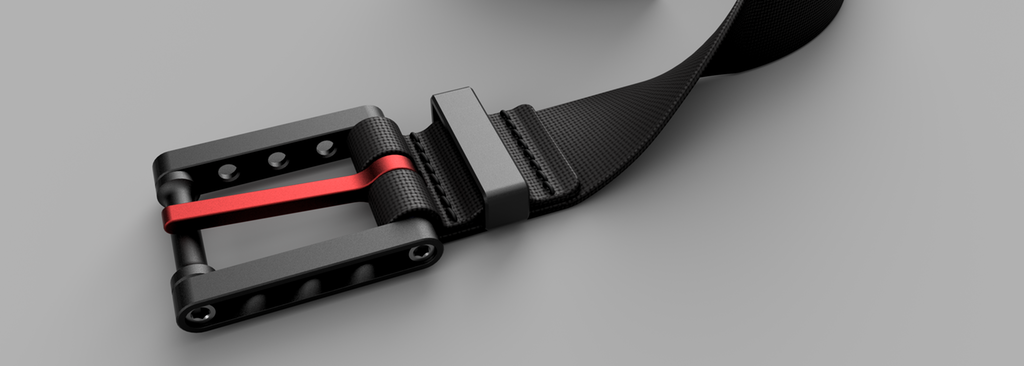 Buksebelte med svart spenne og rød lås på et bord. Illustrasjon.