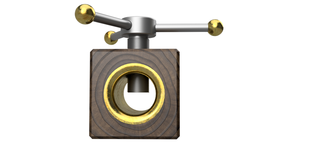 Trekloss med et hull tvers gjennom. Gjennom hele hullet er det gullfarga metall. Det går en skrue inn fra toppen, den har tre pinner ut til sidene med ei gullfarga kule på hver ende. Illustrasjon.