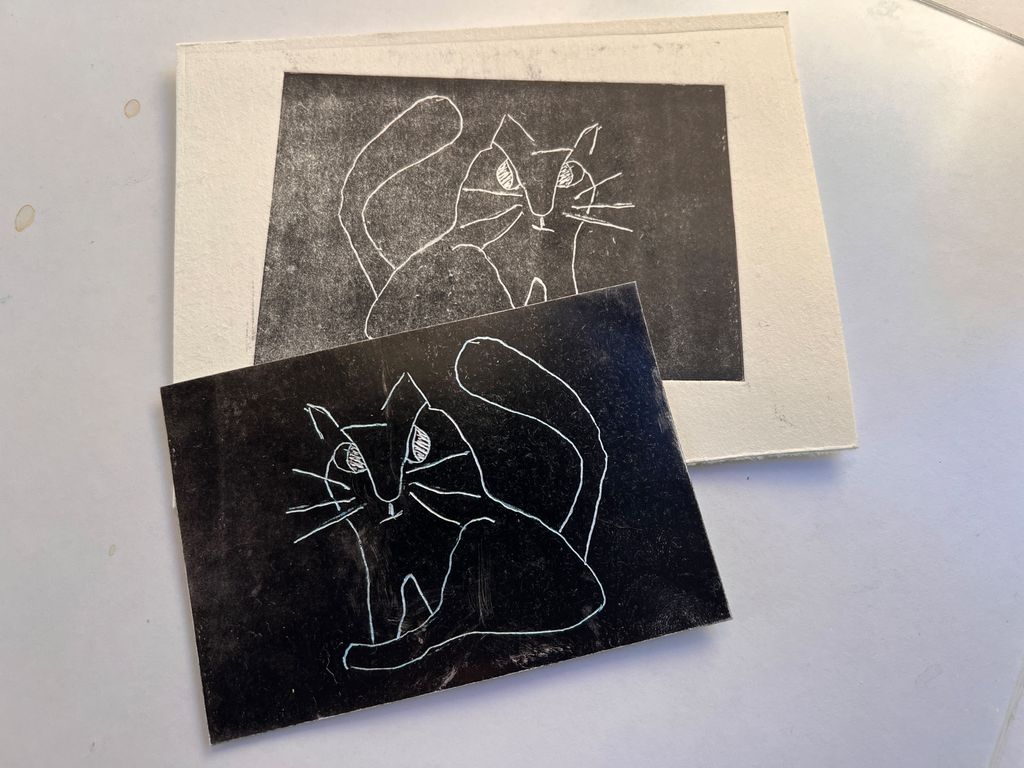 Trykket motiv av en katt. Foto.