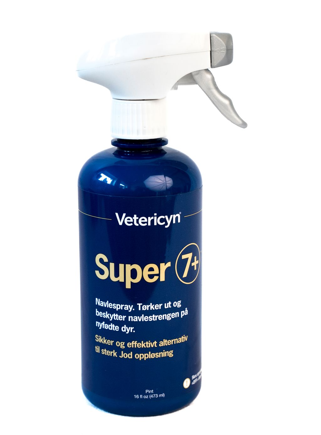 Mørk blå sprayflaske med påskriften Super 7+ Navlespray. Tørker ut og beskytter navlestrengen på nyfødte dyr. Foto.
