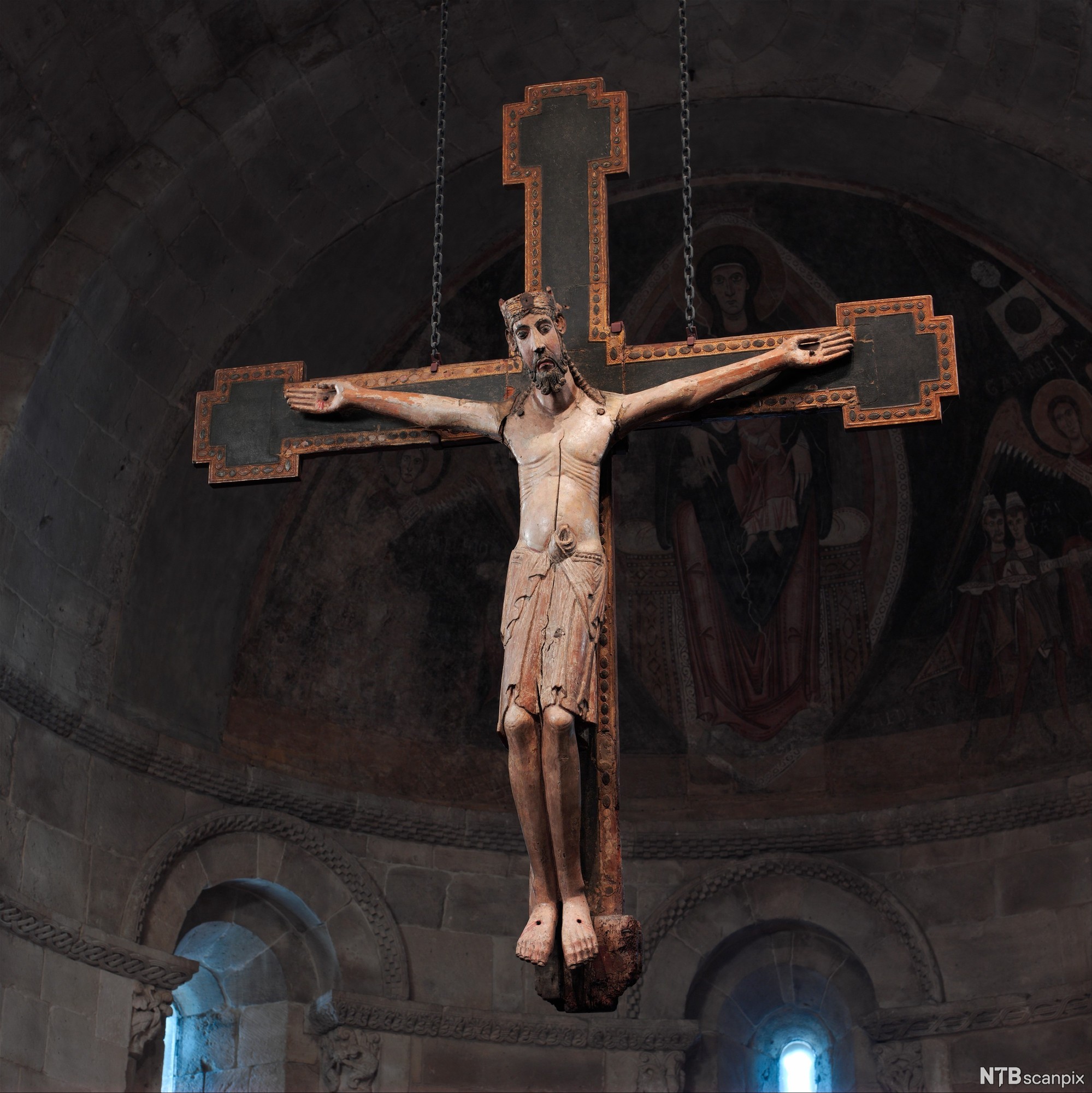 Figur som framstiller Jesus på korset. Illustrasjon.