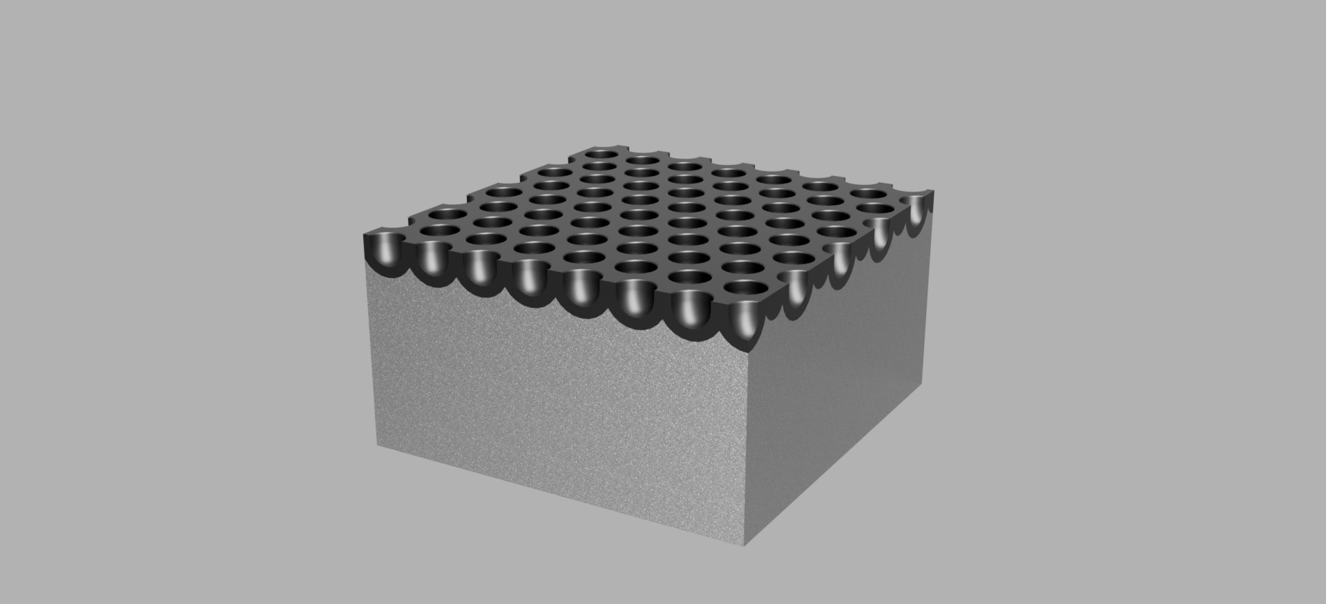 Rektangulær kloss med mange grunne hull i overflata. Illustrasjon.