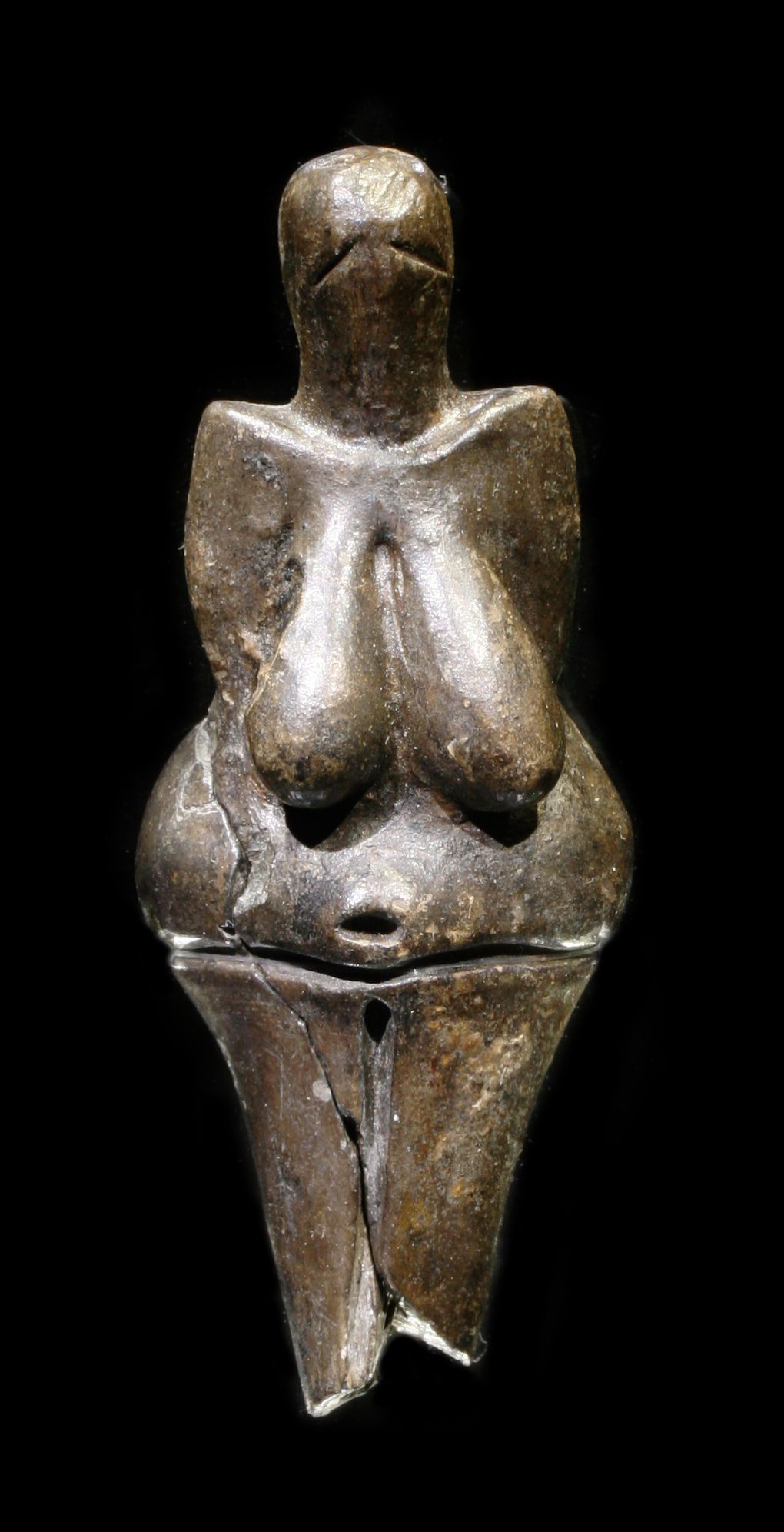 Stilisert kvinnekropp. Skulptur.