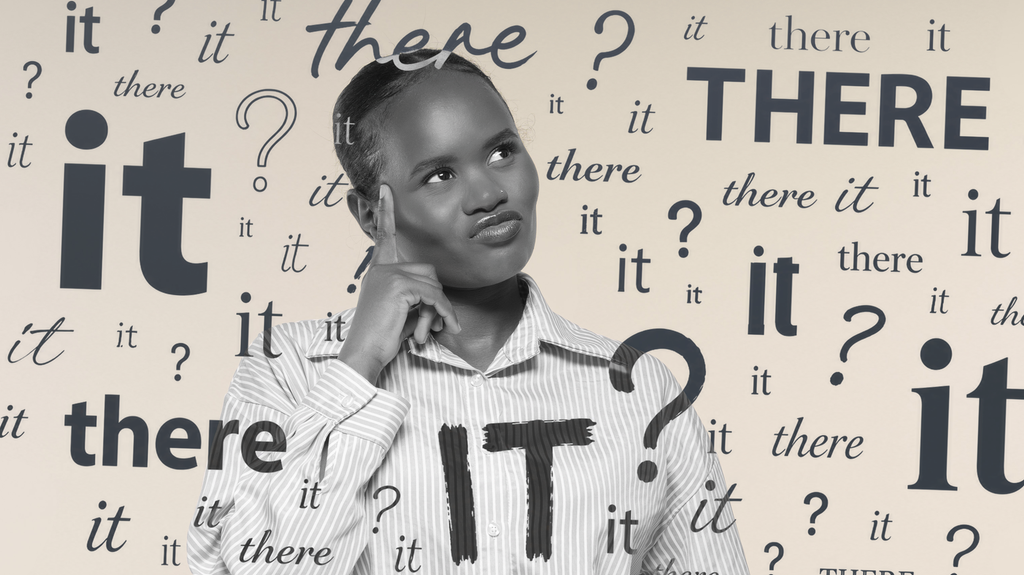 A thinking woman is surrounded by the words "it" and "there". Photo.