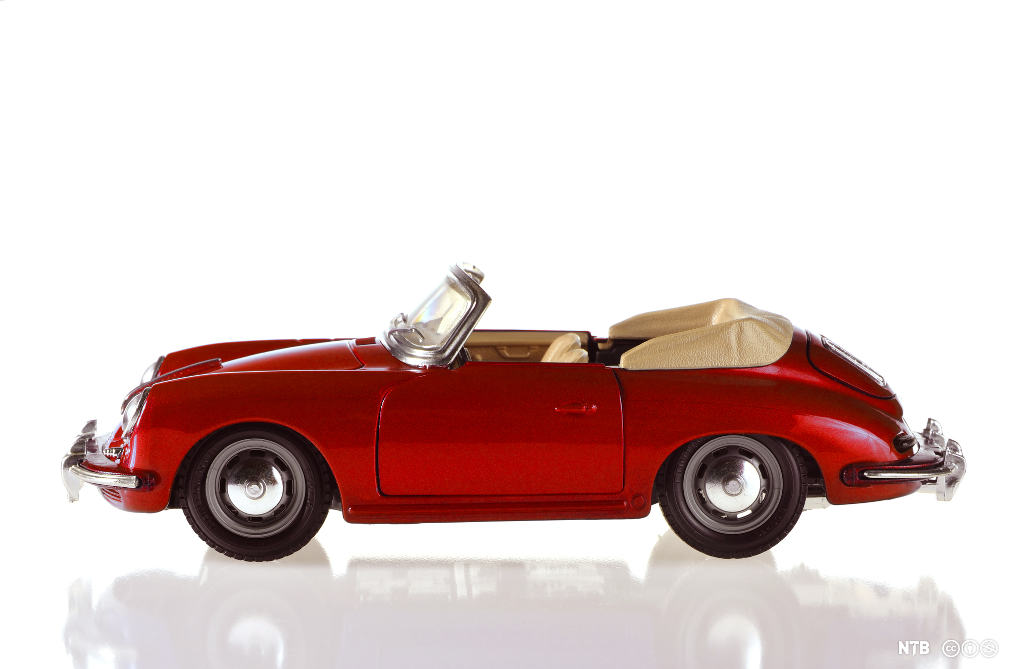 A photo of a red sports car, Porsche 356.