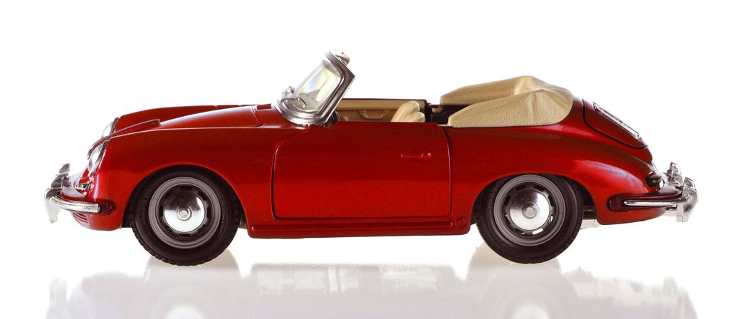 A photo of a red sports car, Porsche 356.