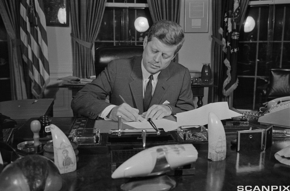 President John F. Kennedy Signing Blockade Order. Photo.