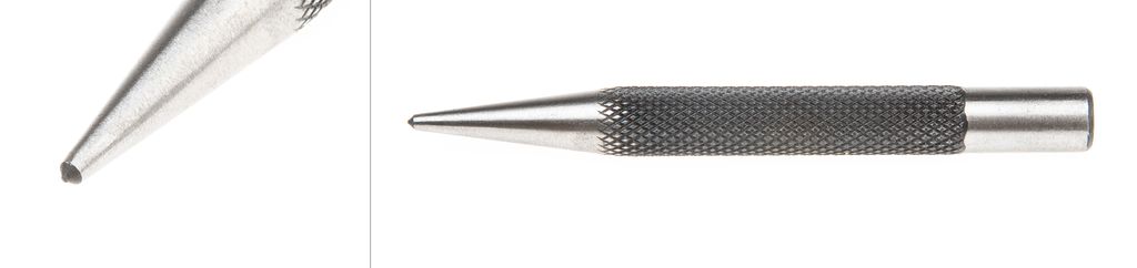 Avlangt sylinderforma verktøy av stål med ein konisk ende. Den koniske enden har ein spiss. Begge endane er i glatt stål, men eit større parti i midten har eit kryssforma, opphøgd mønster. Det gjer det lettare å halde verktøyet fast med handa. Foto.