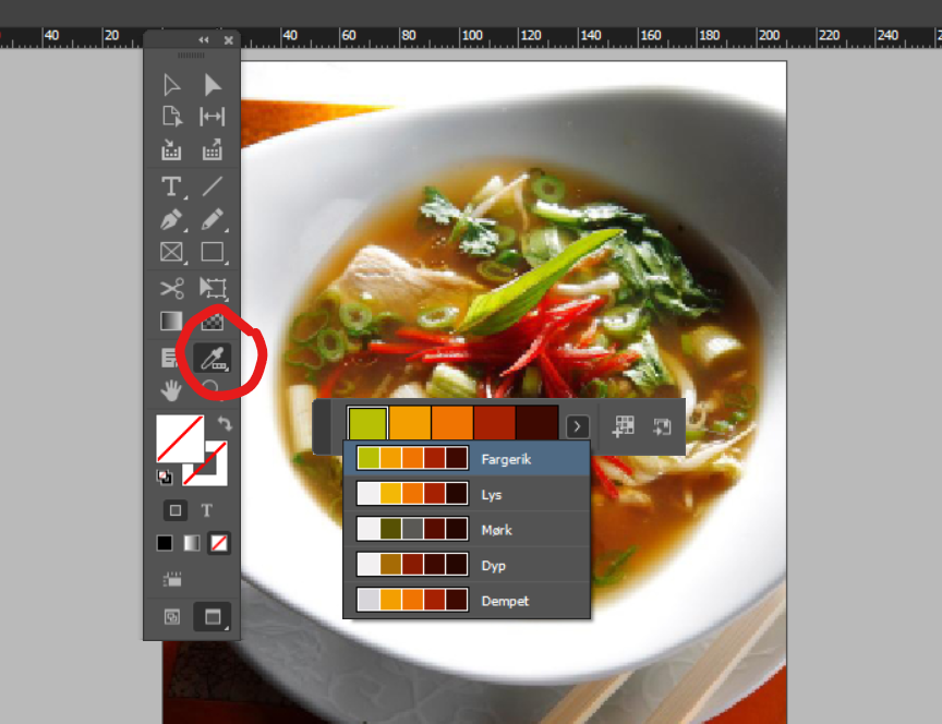 Arbeidsvindu i programmet InDesign. På verktøylinja til venstre er Fargetema-verktøyet markert med en rød sirkel. Skjermdump.