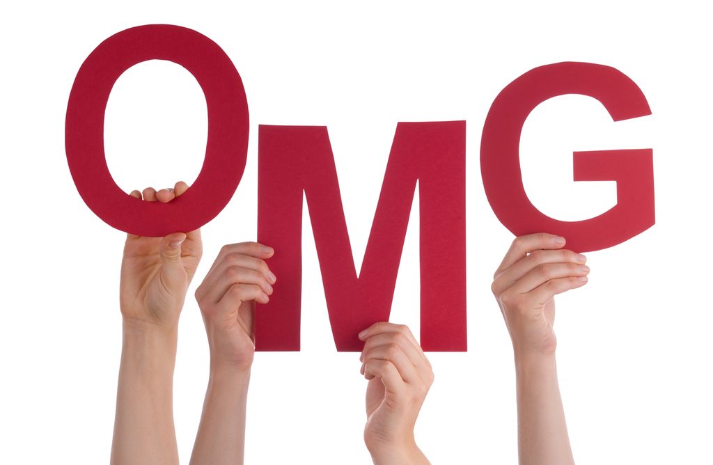 Many People Hands Holding Red Word OMG. Photo.