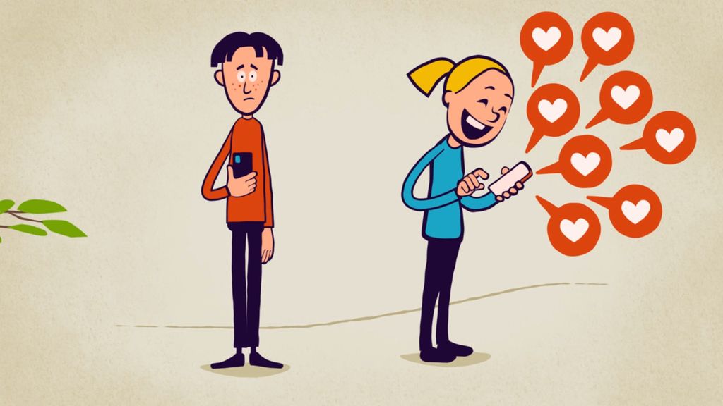 En gutt holder telefonen sin og ser trist ut. Ved siden av står ei jente og ser på sin telefon og ler. Ut fra telefonen hennes kommer det snakkebobler med hjerter. Illustrasjon.