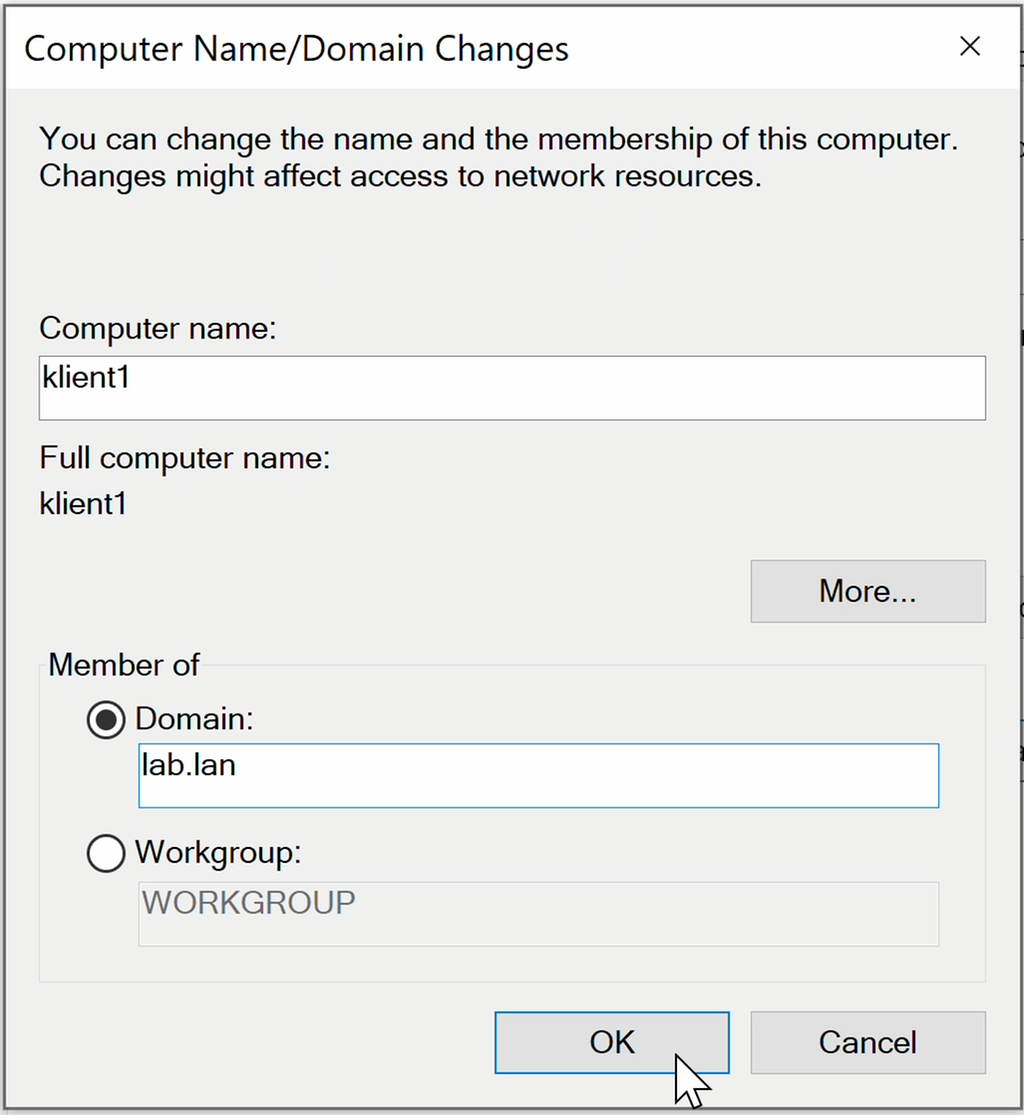 Skjermvindauge med tittelen «Computer name / Domain Changes». Det har eit felt der ein kan endre maskinnamn, og ein radioknapp for å skru på tilknyting til domene. Rett under er det eit felt der ein kan skrive inn domenenamn. Det er skrive inn «lab.lan». Skjermbilete.