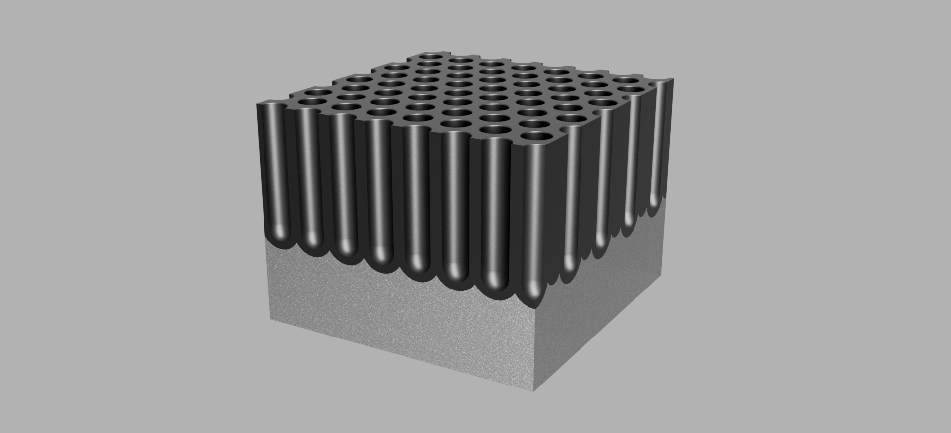 Rektangulær kloss med mange svært dype hull i overflata. Illustrasjon.