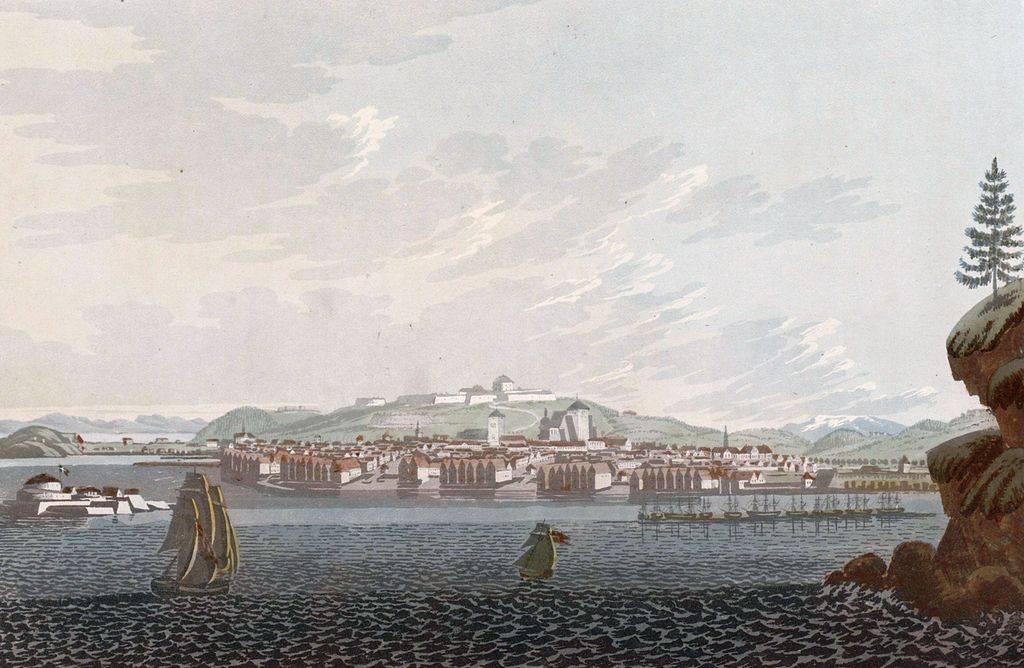 Fra innseilingen til Trondheim på 1700-tallet. Det er skip i forgrunnen, brygger, kirker og festning i bakgrunnen. Maleri.