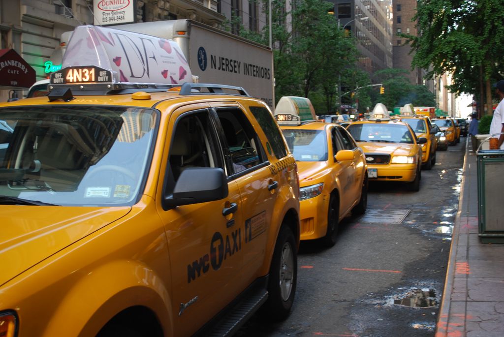 Row of yellow cabs in New York. Photo.