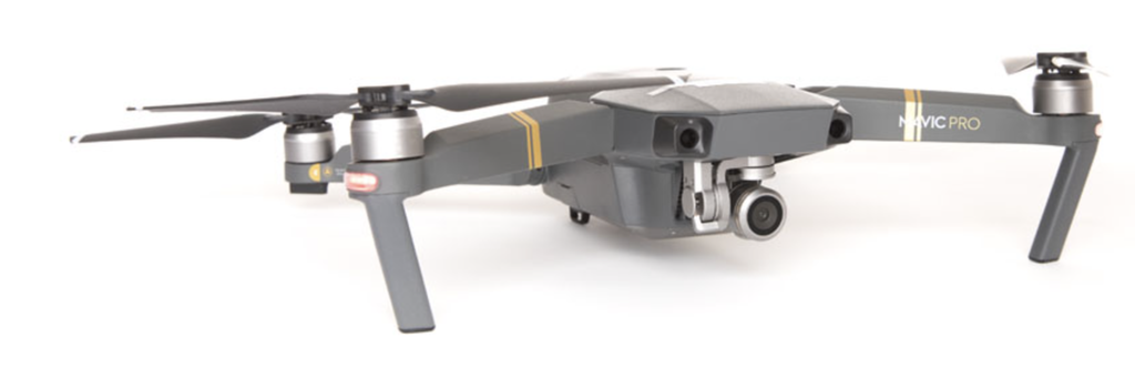 Drone til videoopptak med tre rotorer og en lise. Foto.