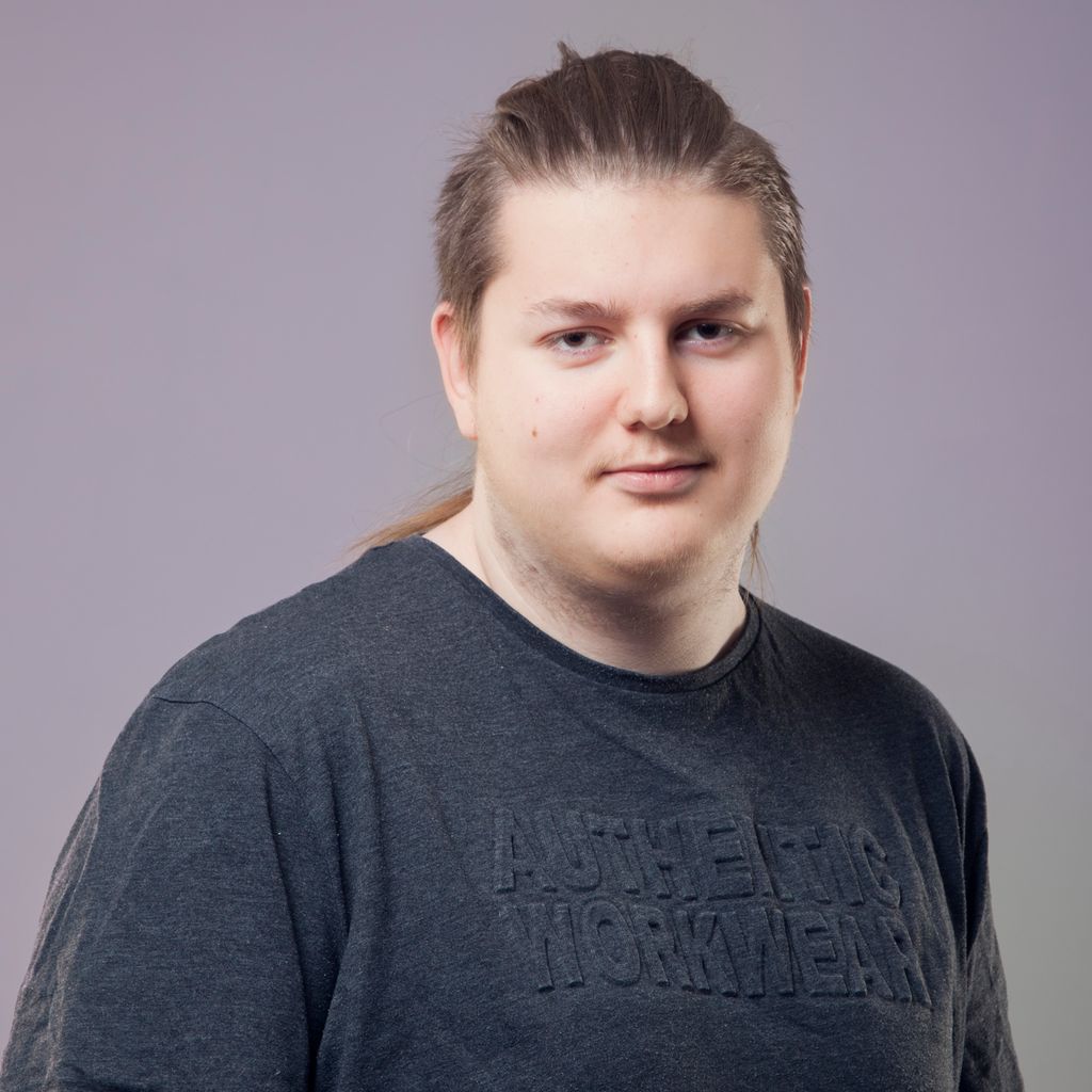 Portrait of a teenage boy looking sceptical. Photo.