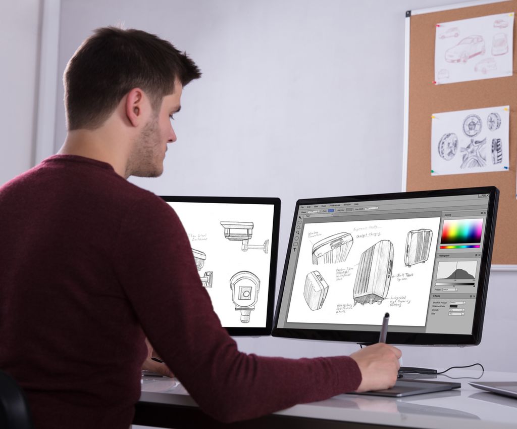 Designer jobber i et tegneprogram. Foto.