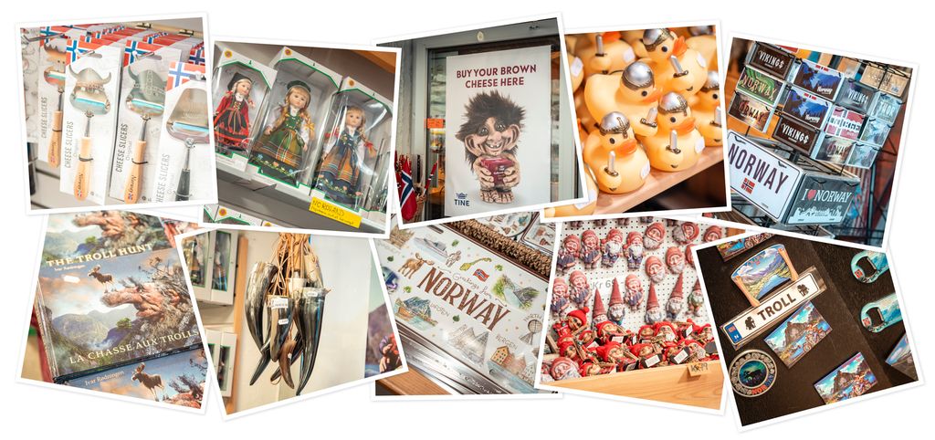 Produkter som selges i en suvenirbutikk: ostehøvler, dukker i bunad, en reklameplakat for brunost med engelsk tekst, badeender med vikinghjelm, bøker om troll, vikinghorn, postkort og magneter med nisser og troll. Foto.