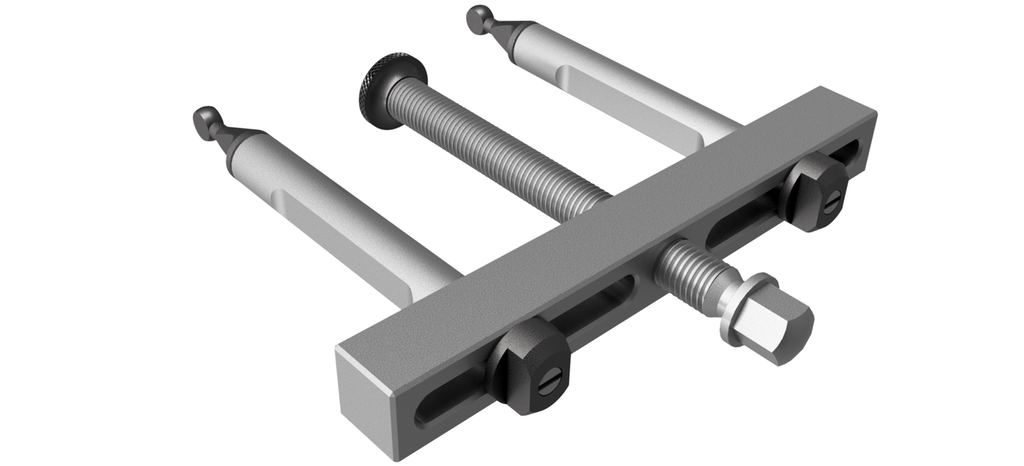 Verktøy med to gripearmer og en gjenget senterskrue festa i en tverrgående stålbit. Illustrasjon.