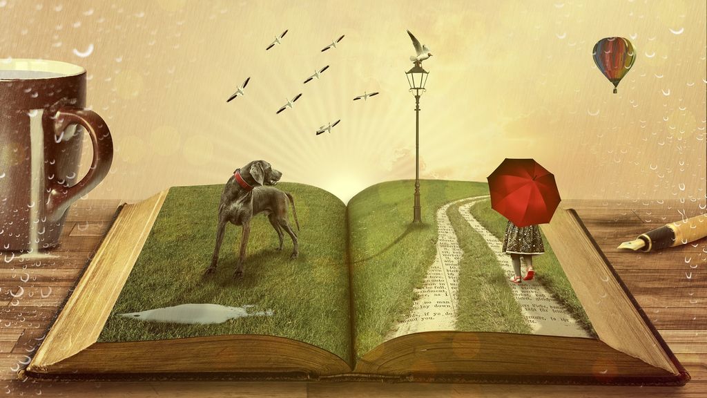 An open book with a landscape on top of it. The landscape has grass, a big dog, a lamppost, a girl with a red umbrella and a road. The book is placed on a desk. There is also a cup and a pen on the desk. Above the book birds are flying and there is also a hot-air-balloon. Illustration.