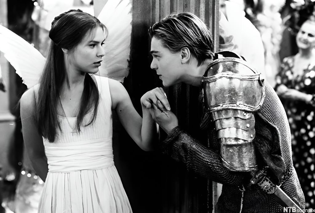 Scene from the movie "Romeo and Juliet" where Romeo meets Julie for the first time at a party arranged by the Capulet family. Photo.