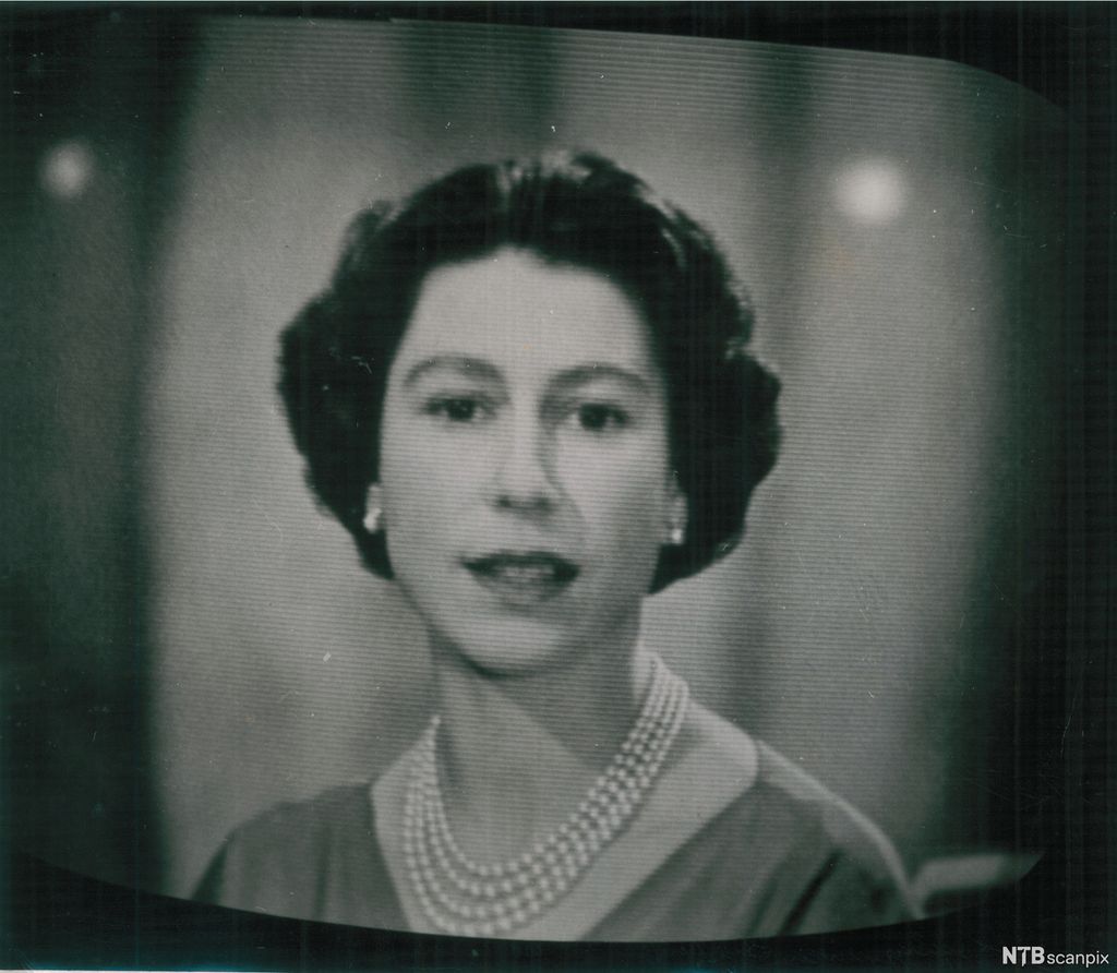 TV screen showing Queen Elizabeth II giving the 1958 Christmas speech. Photo.