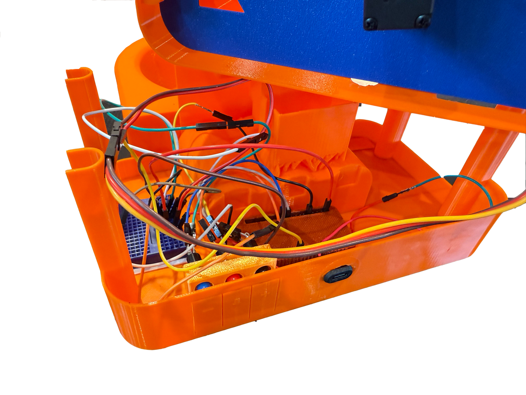 3D-printa del som er påmontert en del elektrokomponenter og ledninger. Foto