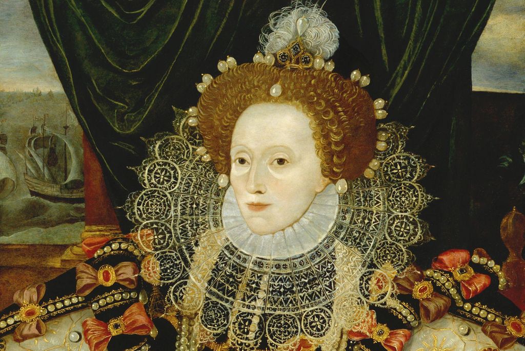 Painting: Queen Elizabeth I. We see a red-haired woman in an elaborate dress with bows, jewellery, lace, silk, and pearls. Her skin is very pale. 