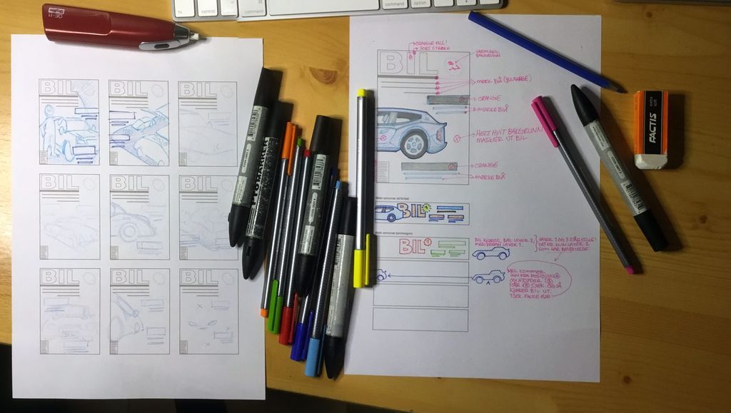 Arbeid med skisser på skrivebordet. Foto.