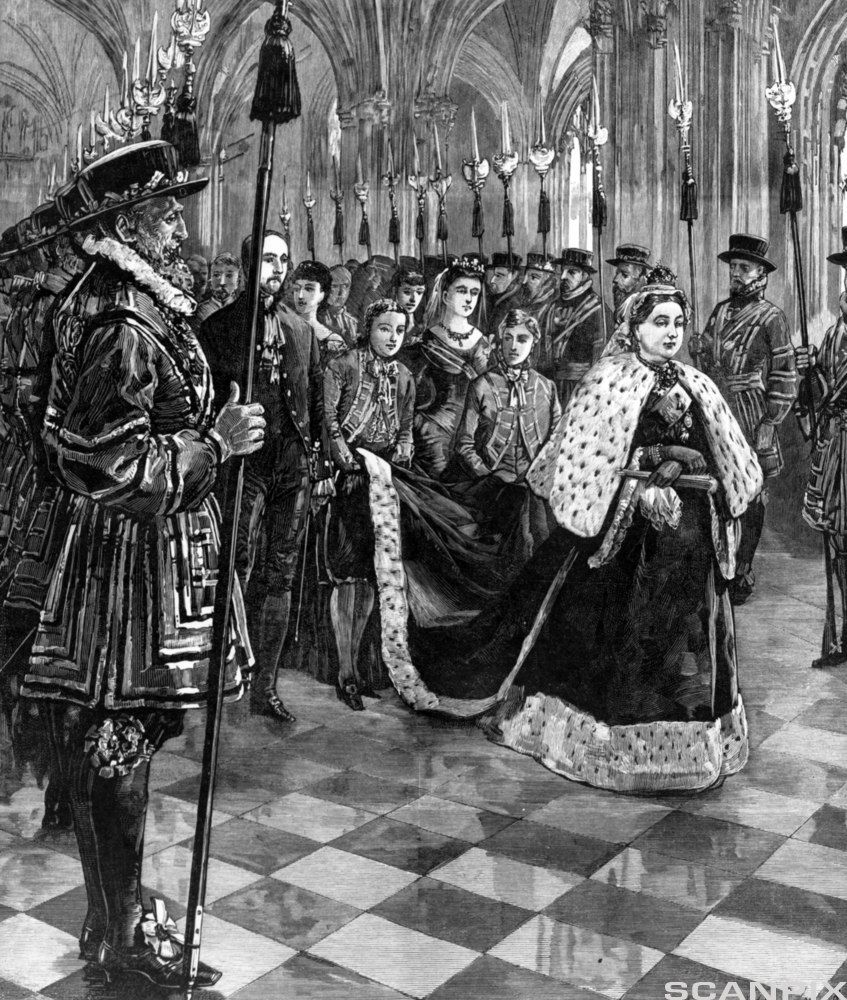Queen Victoria at the front of a procession. A row of Yeomen Warders stand guard on either side of the procession. They are holding decorative spears. Photo.
