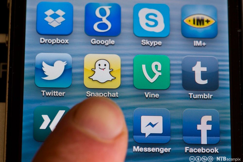 Ikoner for sosiale medier på en mobilskjerm. Foto.