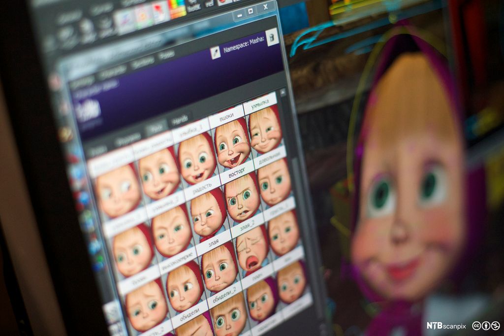En skjerm viser animasjonsfiguren Masha animert med mange ulike ansiktsuttrykk. Bilde.