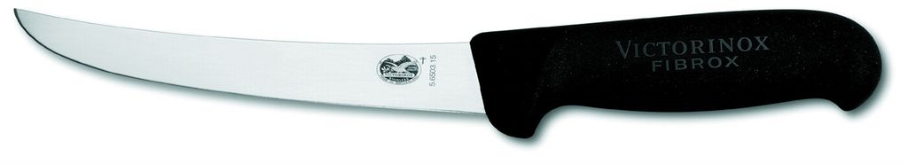 En utbeiningskniv mot hvit bakgrunn. Foto.