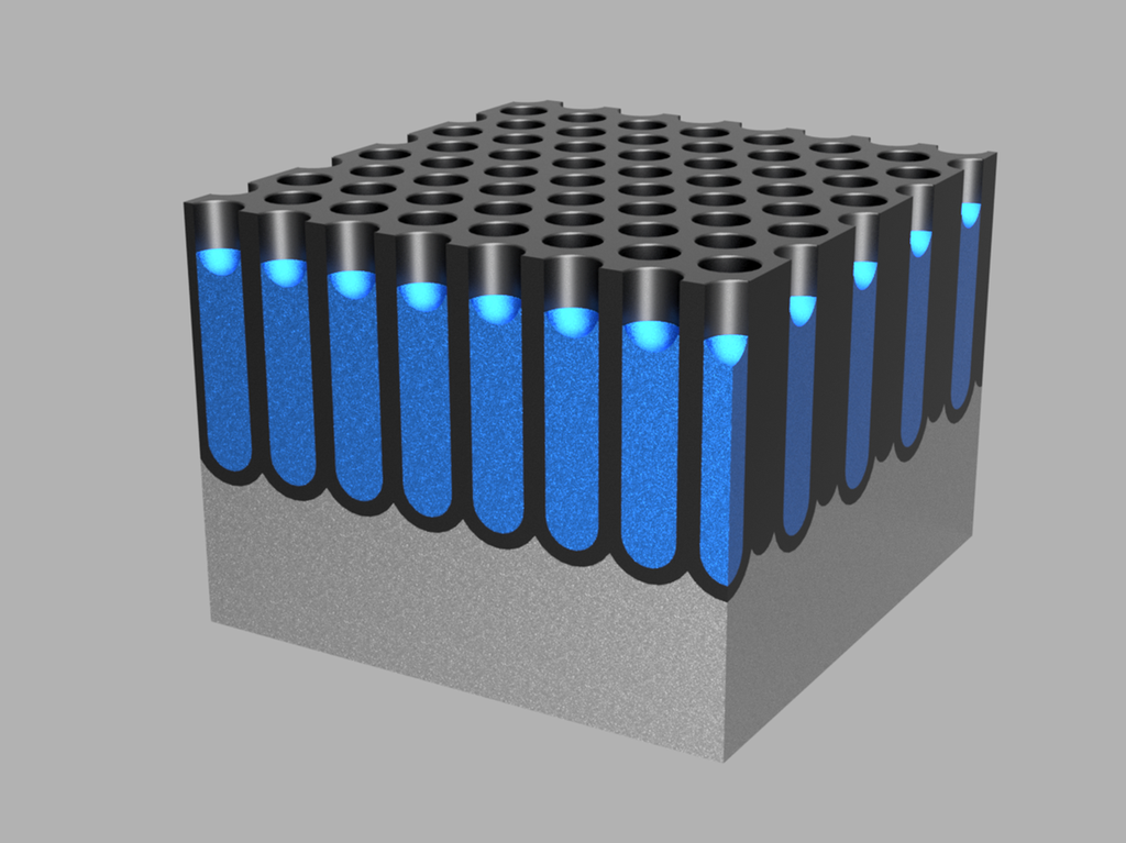 Rektangulær kloss med mange dype hull i overflata. Hulla er fylt opp nesten helt med blå farge. Illustrasjon.