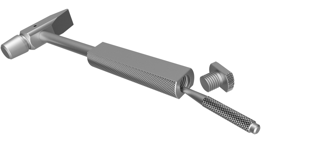 Sølvfarga hammer med bredt håndtak som er åpna i enden, og en spiss kjørner er tatt nesten helt ut av åpningen. En gjenga plugg ligger ved siden av. Illustrasjon.