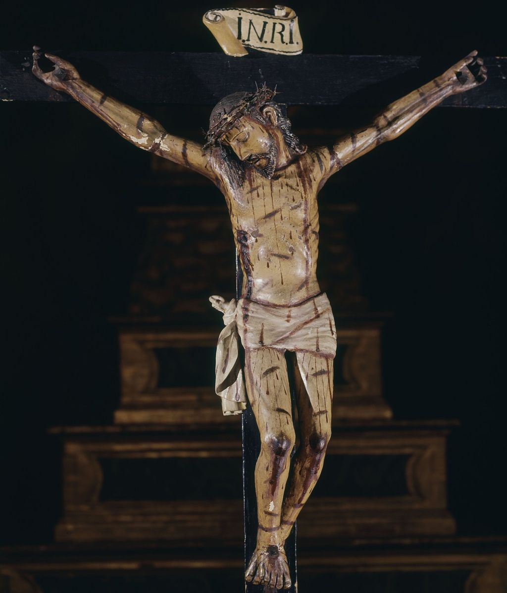 Figur som viser Jesus på korset. Kunst.
