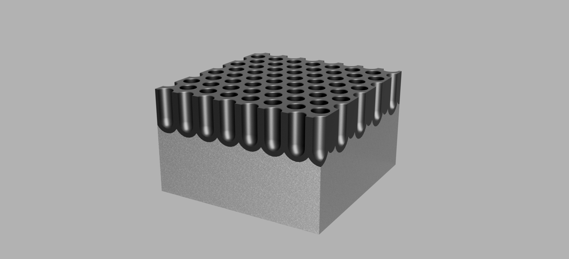 Rektangulær kloss med mange middels dype hull i overflata. Illustrasjon.