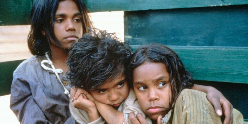 The three girls Molly, Gracie, and Daisy look scared. They huddle together, seeking comfort from each other. Photo. 